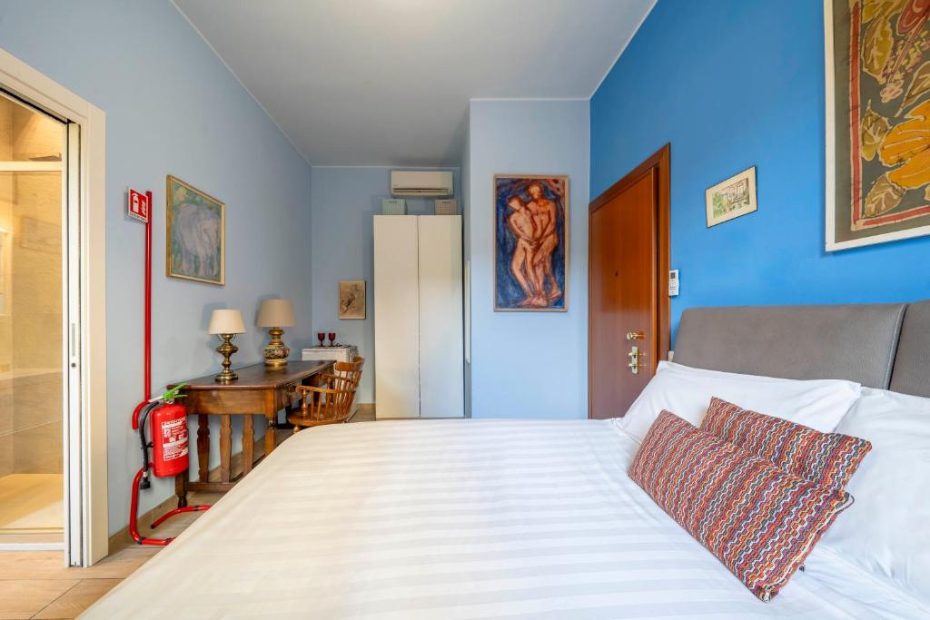 Postel nebo postele na pokoji v ubytování Charming Room Battaglia Appartamenti