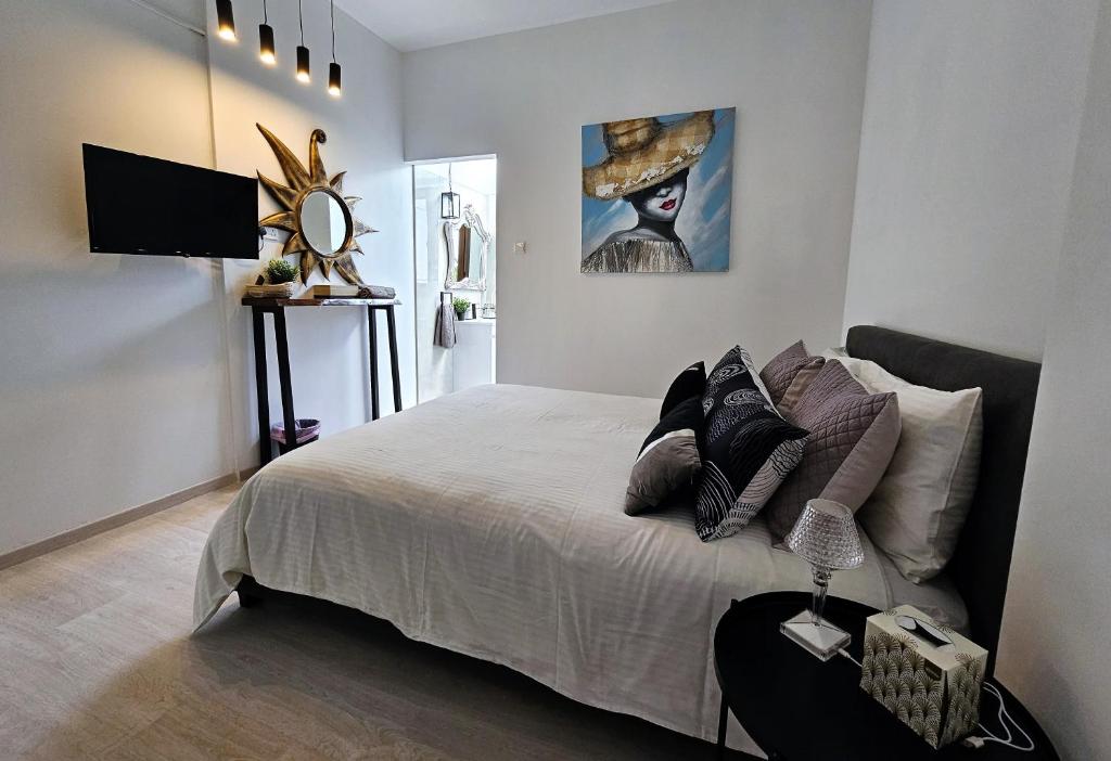 Postel nebo postele na pokoji v ubytování Kasparis View Residence