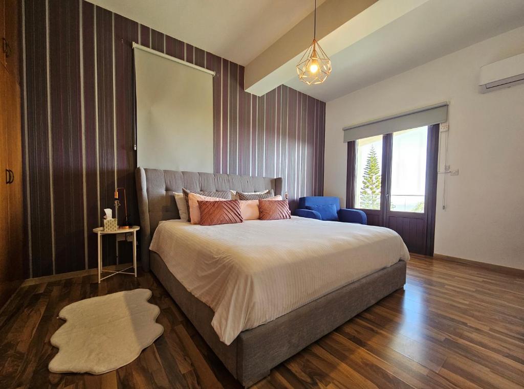Postel nebo postele na pokoji v ubytování Kasparis View Residence