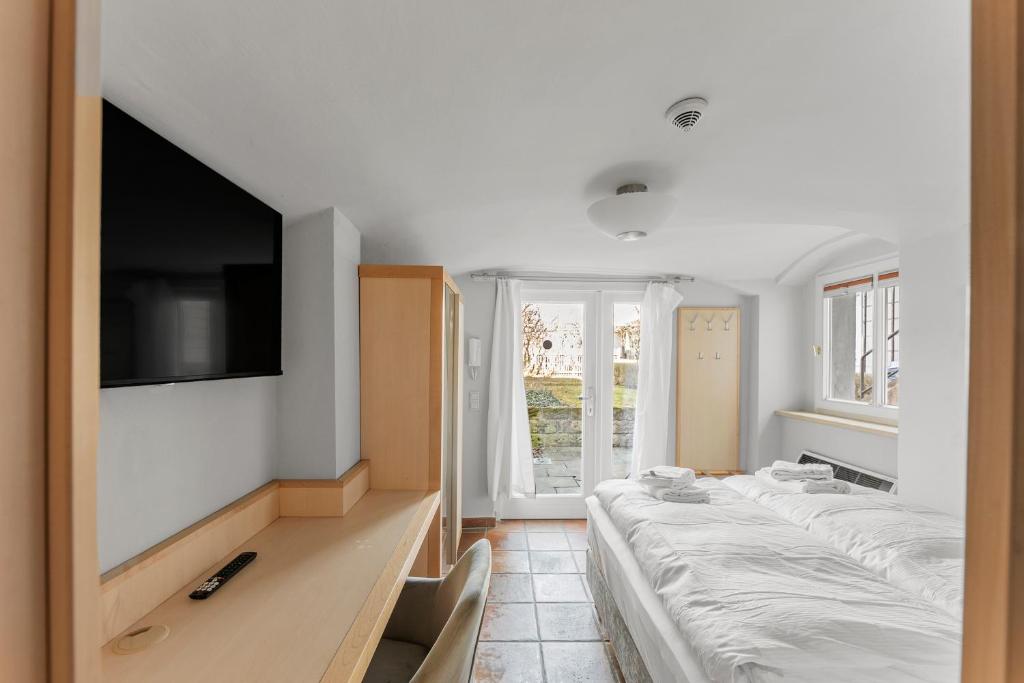 Postel nebo postele na pokoji v ubytování Hotel Friedrichstadt