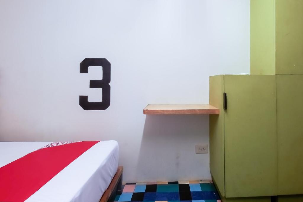Postel nebo postele na pokoji v ubytování Spot On Junction Hostel
