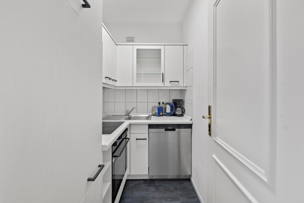 Kuchyň nebo kuchyňský kout v ubytování Hotel Friedrichstadt