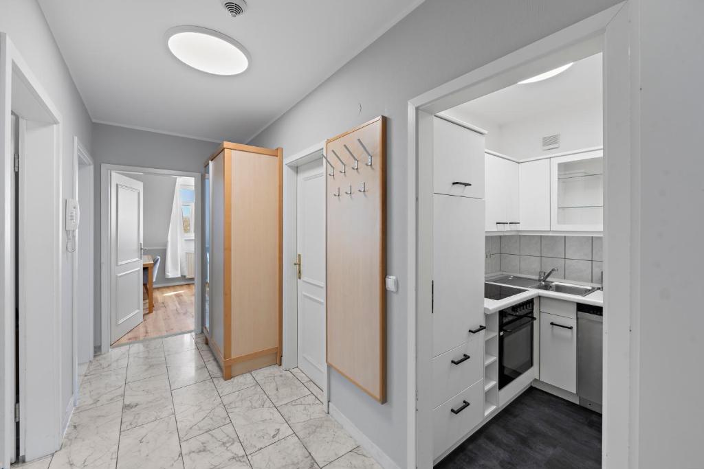 Kuchyň nebo kuchyňský kout v ubytování Hotel Friedrichstadt