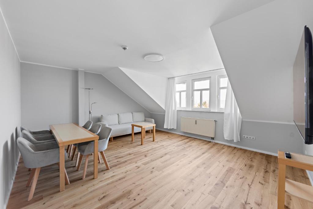 TV a/nebo společenská místnost v ubytování Hotel Friedrichstadt
