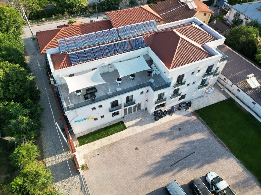 an overhead view of a white building with a red roof at Polu-X in Vama Veche