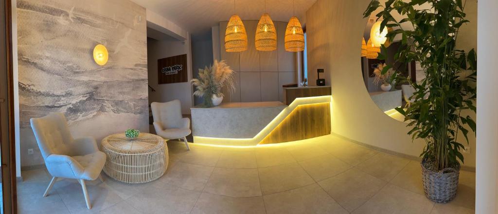 Posezení v ubytování Łeba Park Resort - Domki
