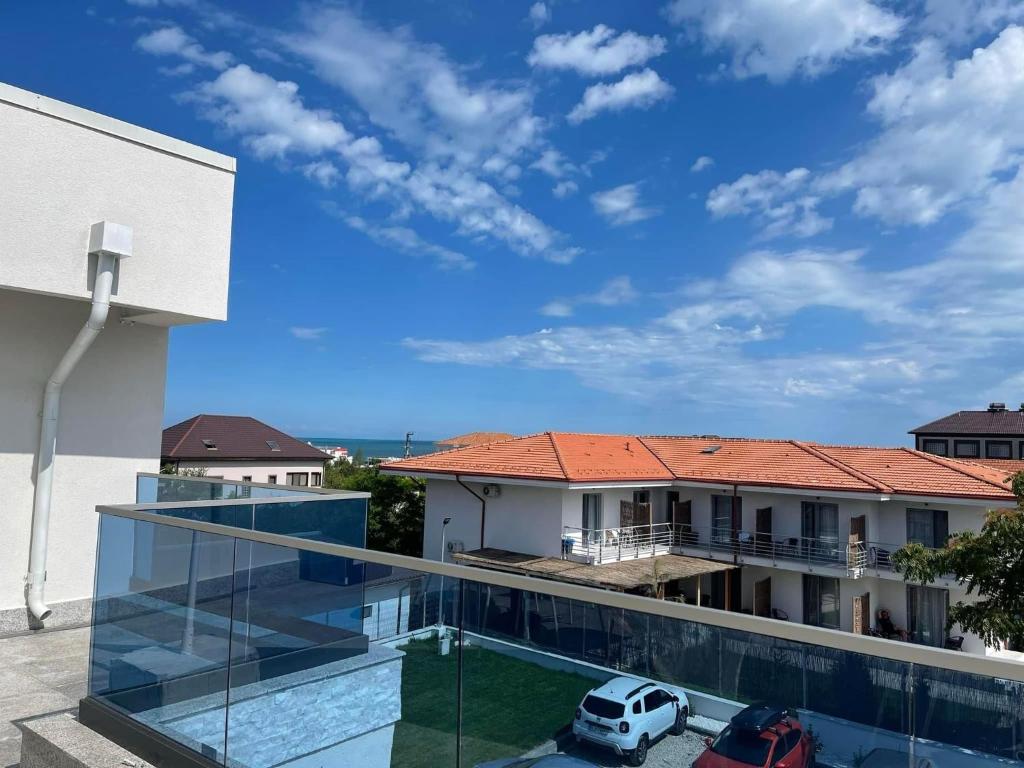 a view from the balcony of a house at Polu-X in Vama Veche