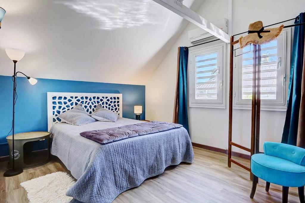 Postel nebo postele na pokoji v ubytování Villa Vue-Belle