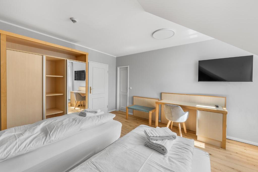 Postel nebo postele na pokoji v ubytování Hotel Friedrichstadt