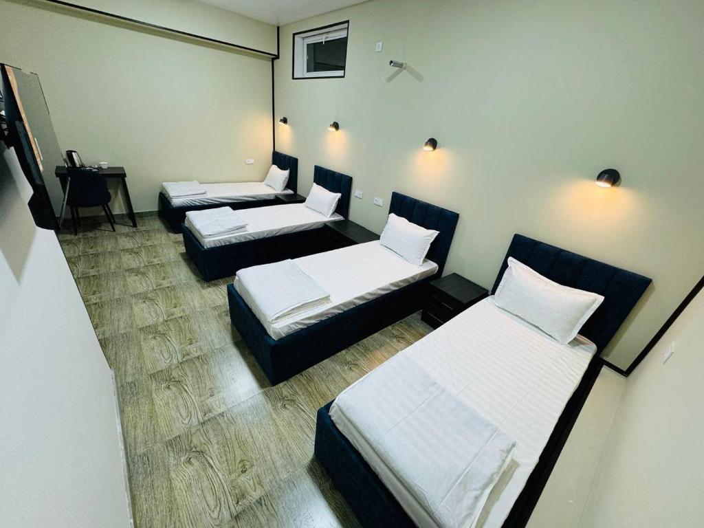 Grand Horizon Hotel - Deluxe Vierbettzimmer