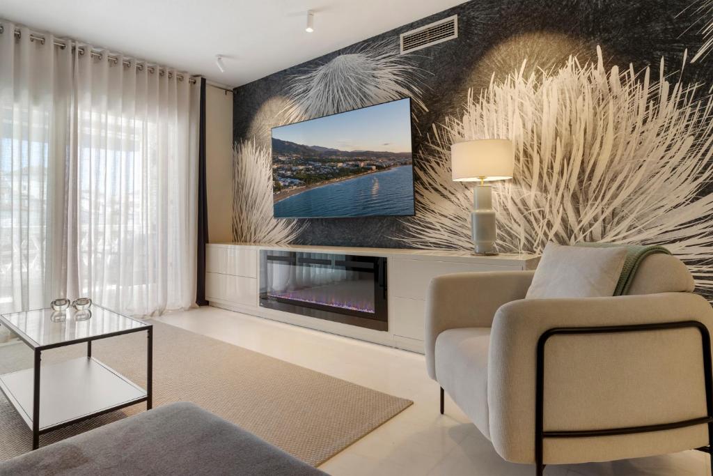 TV a/nebo společenská místnost v ubytování Espacioso y encantador apartamento en las gaviotas