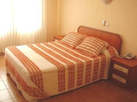 Postel nebo postele na pokoji v ubytování Alize Hotel