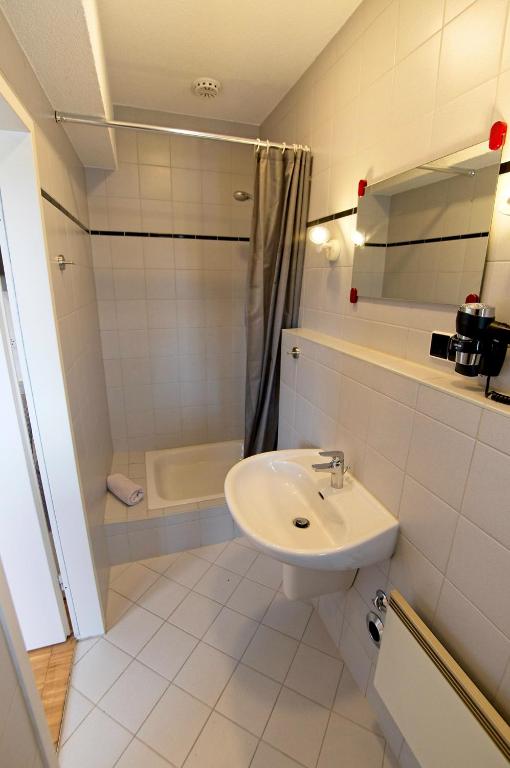Koupelna v ubytování Boardinghouse Steinen