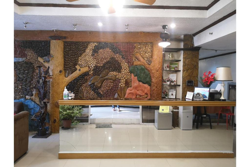 Gallery image of OYO 880 Flores De Musa Inn in Puerto Princesa City