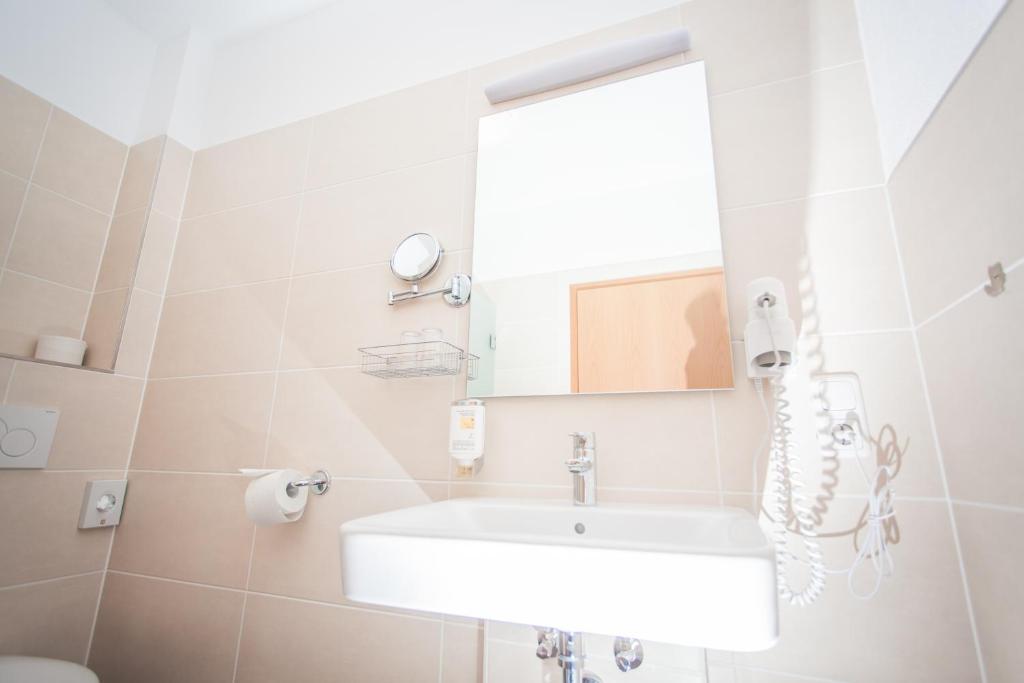 Koupelna v ubytování GS Hotel