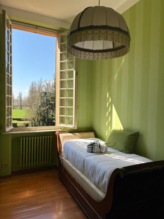Postel nebo postele na pokoji v ubytování Dimora Pani e Tulipani
