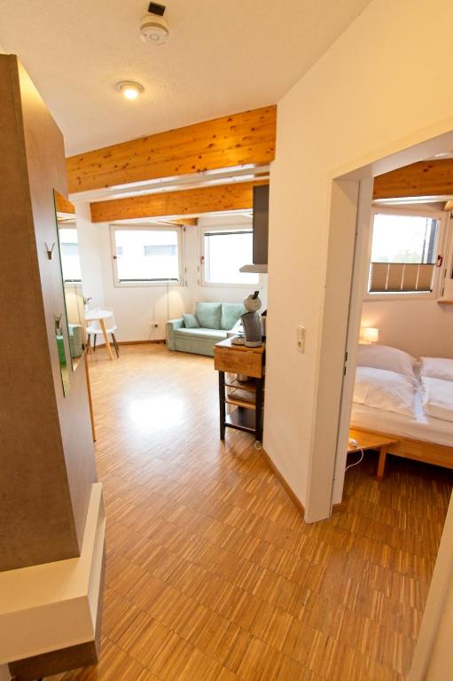 Postel nebo postele na pokoji v ubytování Boardinghouse Steinen