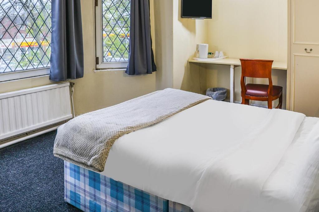 Postel nebo postele na pokoji v ubytování Hotel 346