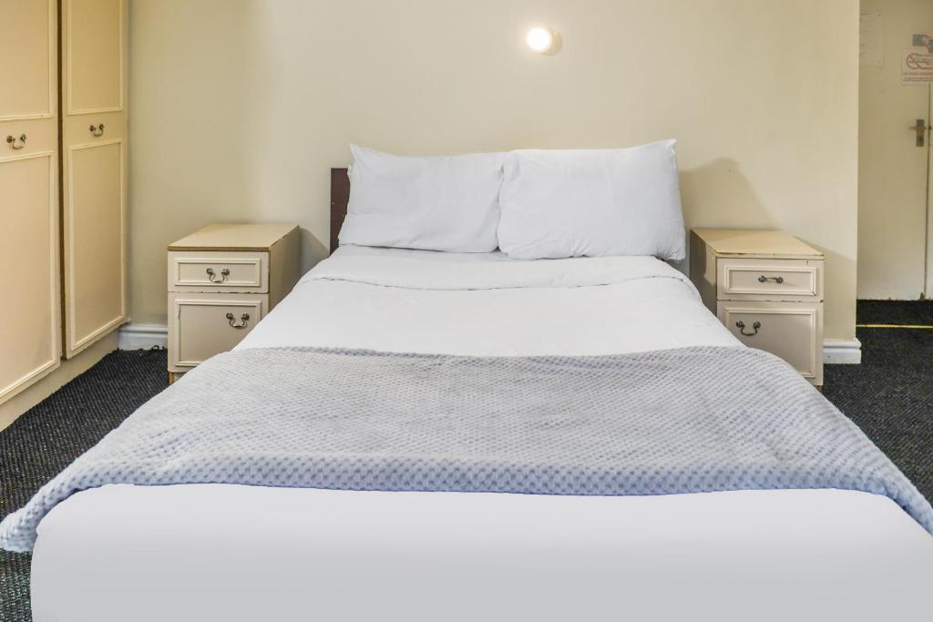 Postel nebo postele na pokoji v ubytování Hotel 346