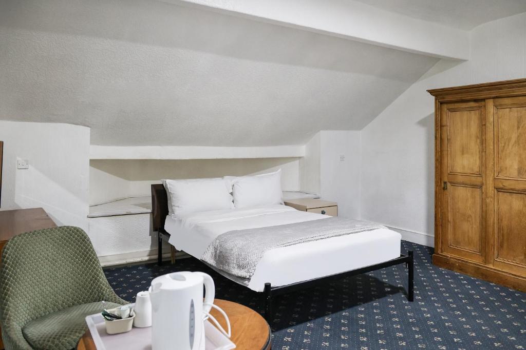 Postel nebo postele na pokoji v ubytování Hotel 346