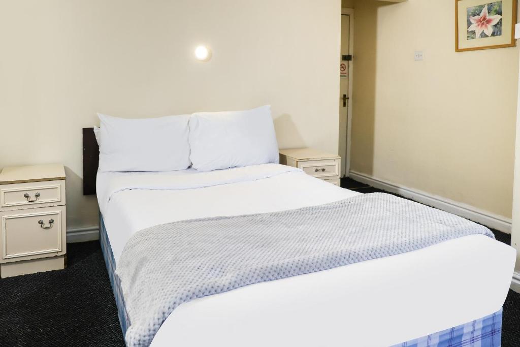 Postel nebo postele na pokoji v ubytování Hotel 346