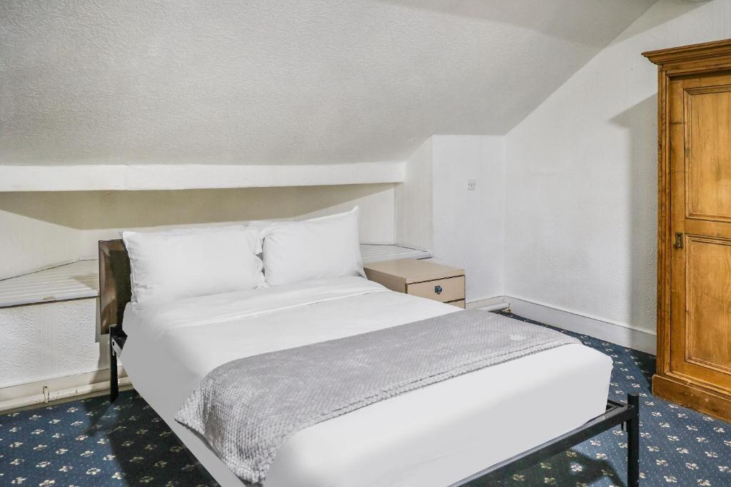 Postel nebo postele na pokoji v ubytování Hotel 346