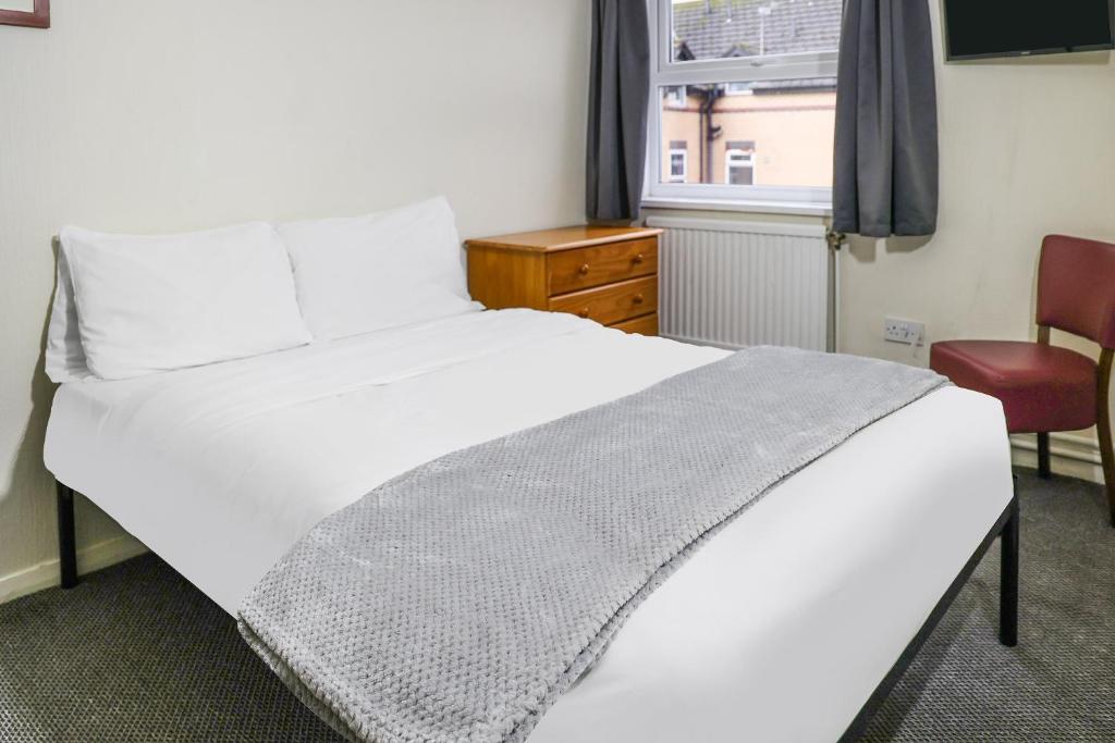 Postel nebo postele na pokoji v ubytování Hotel 346