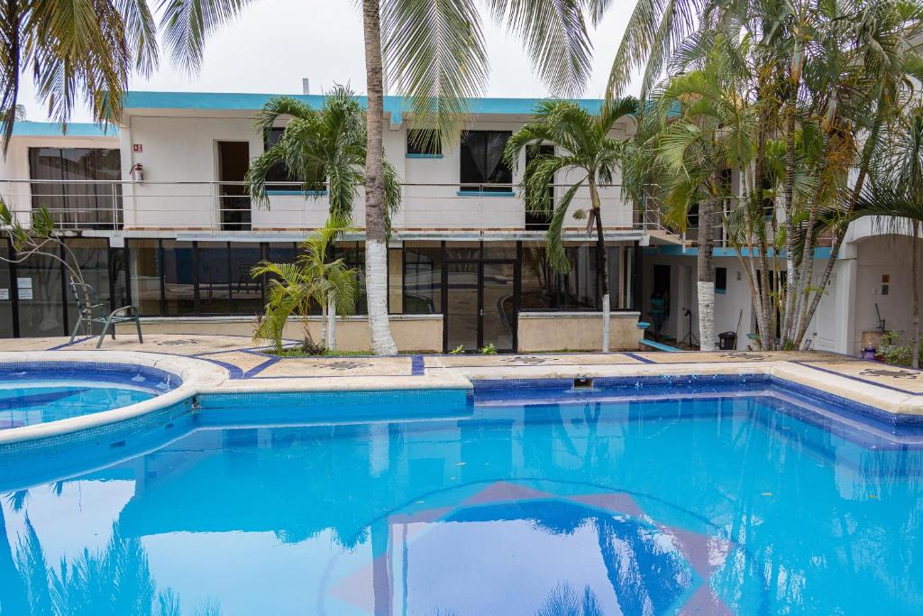 Bazén v ubytování OYO Hotel Marías,Aeropuerto Internacional de Chetumal nebo v jeho okolí