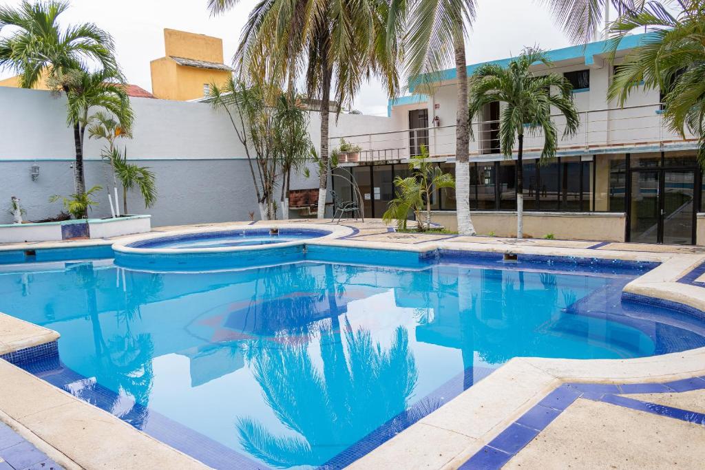 Bazén v ubytování OYO Hotel Marías,Aeropuerto Internacional de Chetumal nebo v jeho okolí