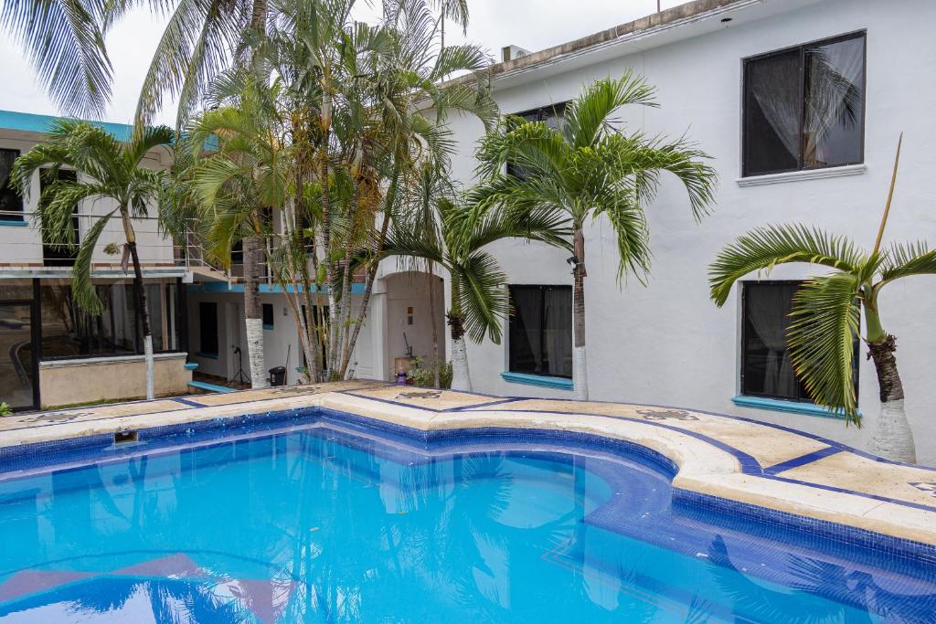 Bazén v ubytování OYO Hotel Marías,Aeropuerto Internacional de Chetumal nebo v jeho okolí