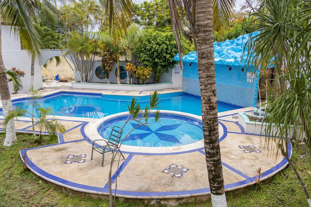 Bazén v ubytování OYO Hotel Marías,Aeropuerto Internacional de Chetumal nebo v jeho okolí