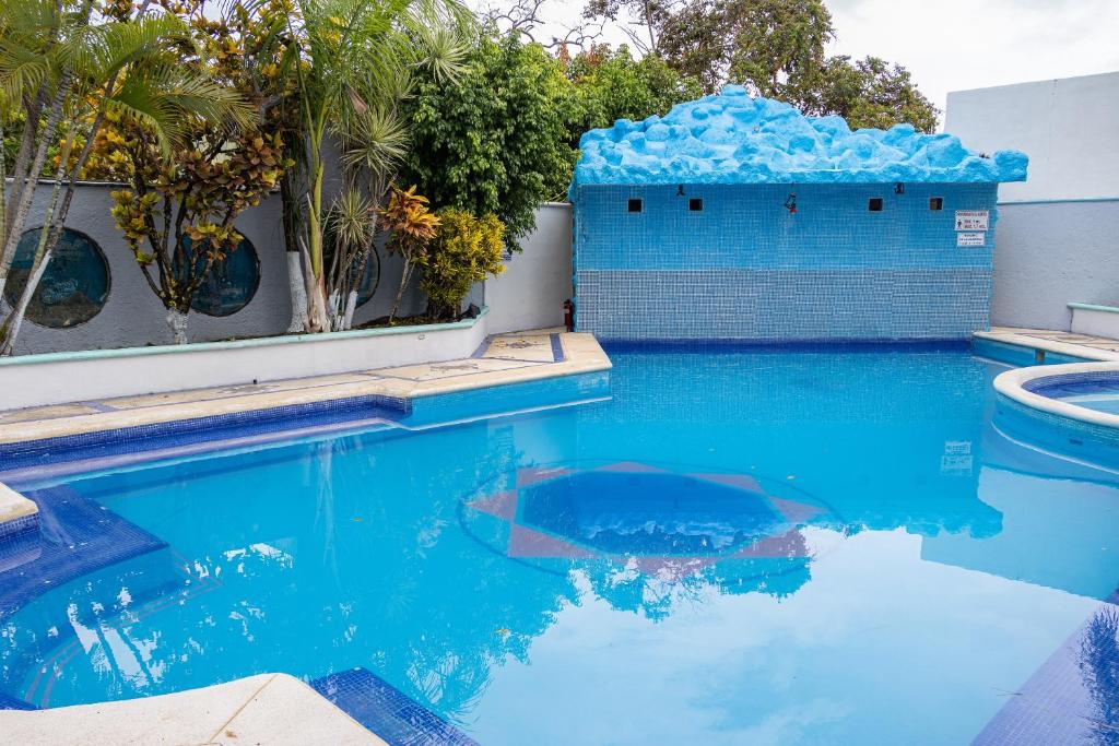Bazén v ubytování OYO Hotel Marías,Aeropuerto Internacional de Chetumal nebo v jeho okolí