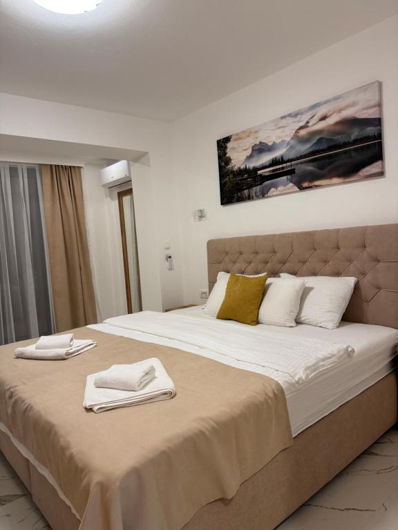 Postel nebo postele na pokoji v ubytování Hotel Freiburg