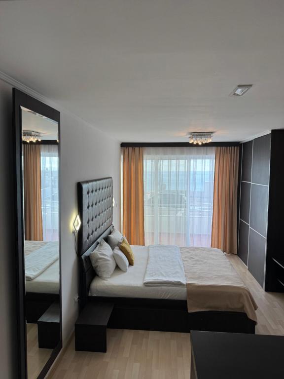 Postel nebo postele na pokoji v ubytování Hotel Freiburg