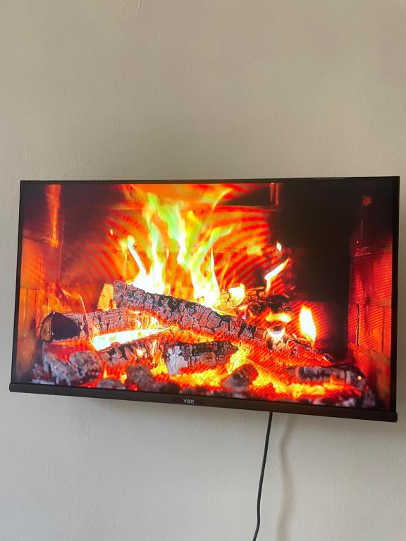 TV a/nebo společenská místnost v ubytování The Nest