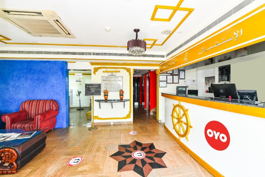 TV a/nebo společenská místnost v ubytování OYO 137 Marina Hotel