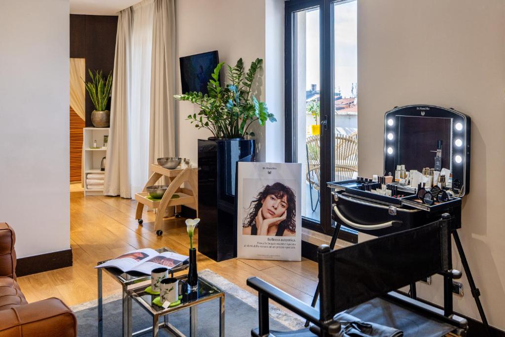 TV a/nebo společenská místnost v ubytování Starhotels Ritz