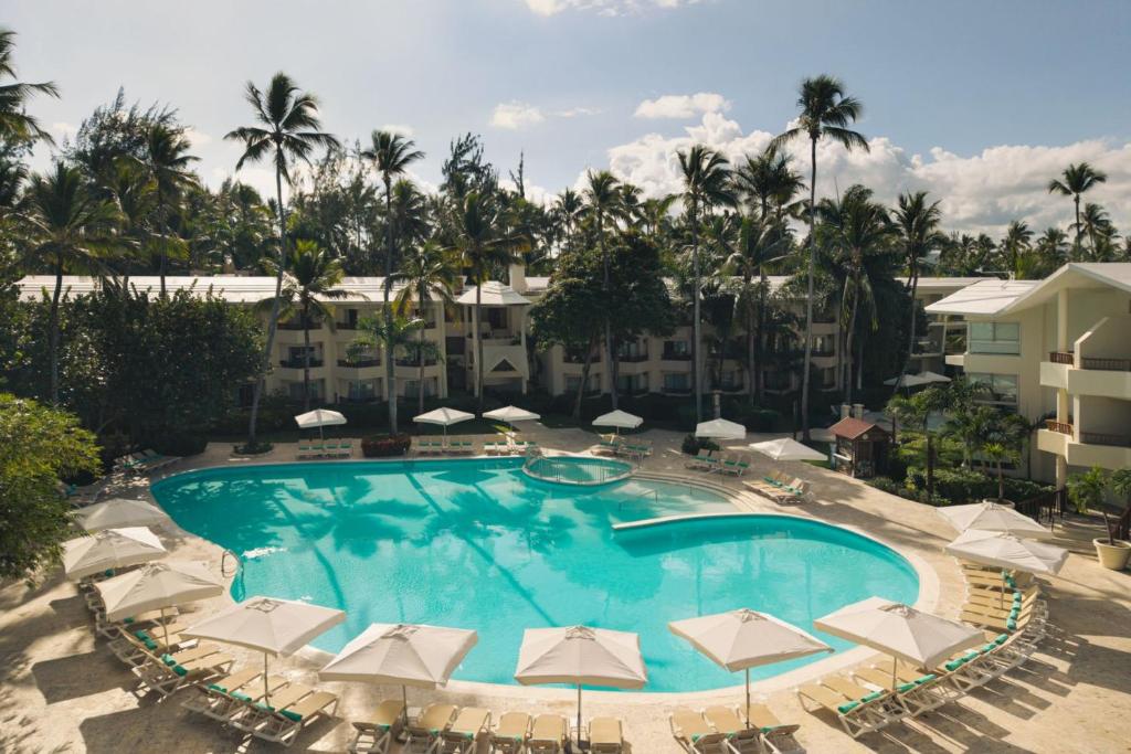 an overhead view of a swimming pool with umbrellas at Impressive Premium Punta Cana - All Inclusive in Punta Cana