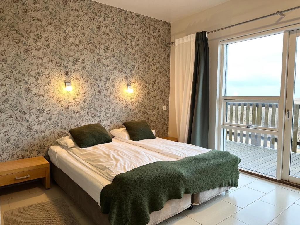 Postel nebo postele na pokoji v ubytování Hotel Laki