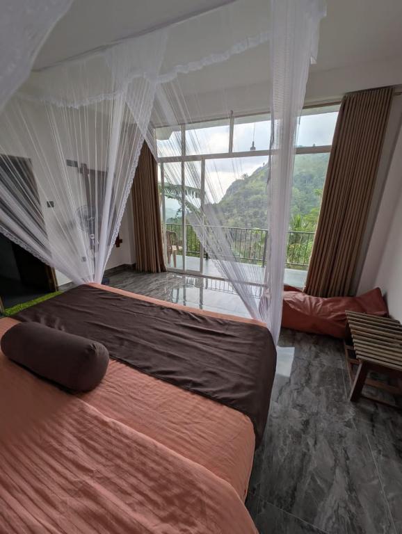 Postel nebo postele na pokoji v ubytování Chamodya Home Stay
