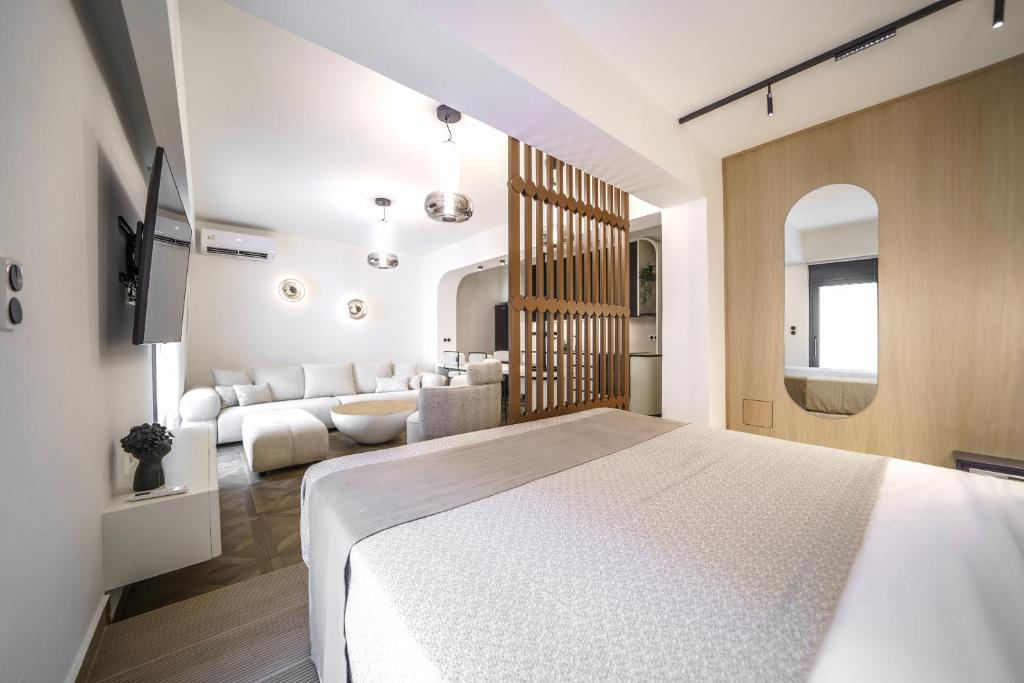 Postel nebo postele na pokoji v ubytování Allegro Suites