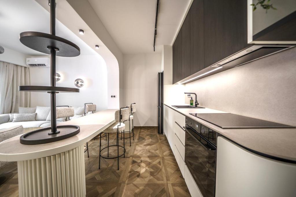Kuchyň nebo kuchyňský kout v ubytování Allegro Suites