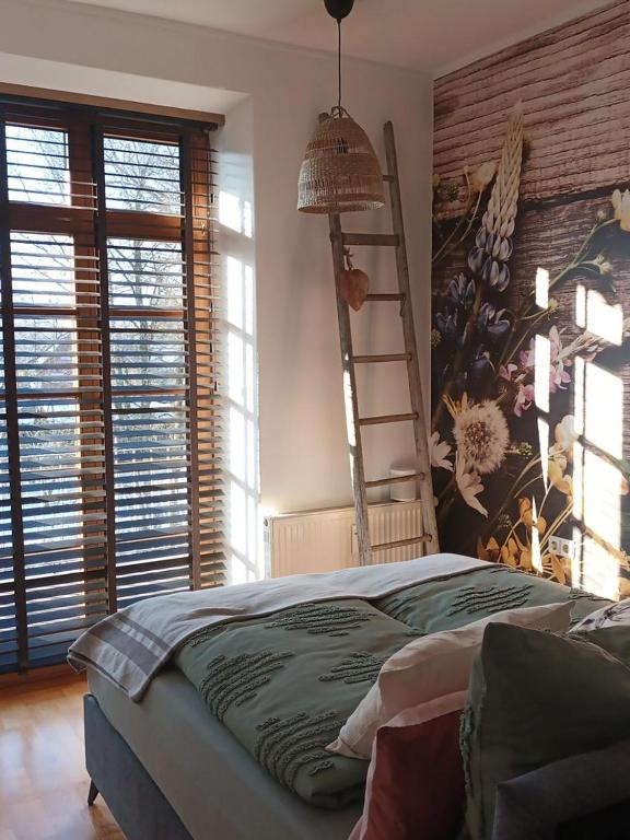 Ένα ή περισσότερα κρεβάτια σε δωμάτιο στο AllgäuLoft im Sennhof