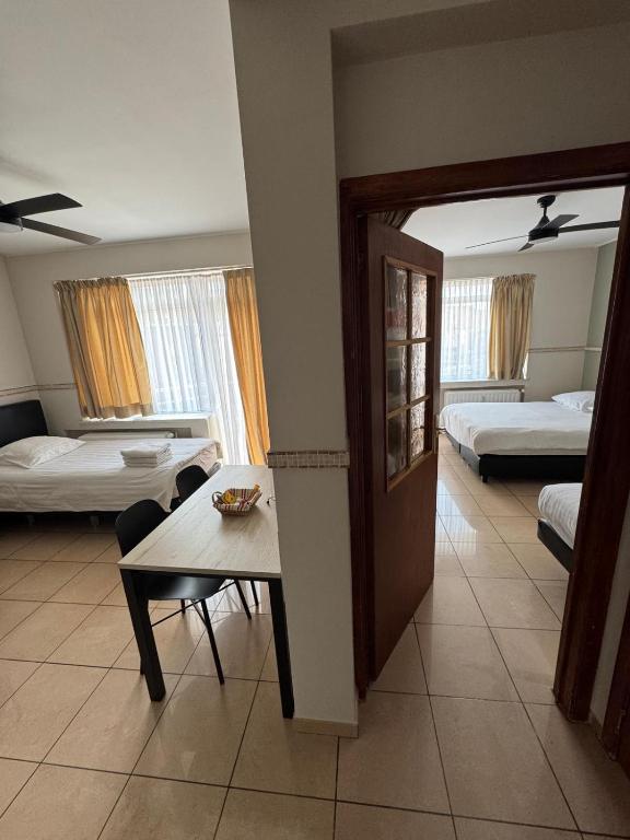 Postel nebo postele na pokoji v ubytování Aparthotel Résidence Bara Midi