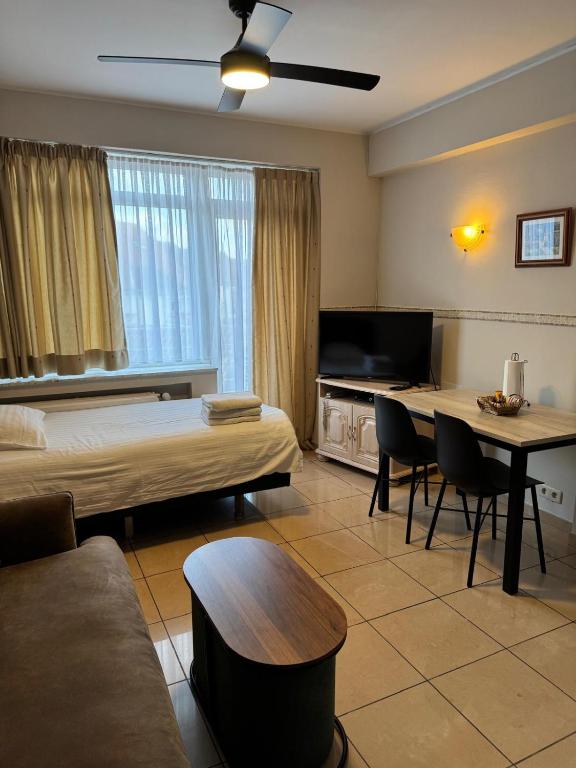 Postel nebo postele na pokoji v ubytování Aparthotel Résidence Bara Midi