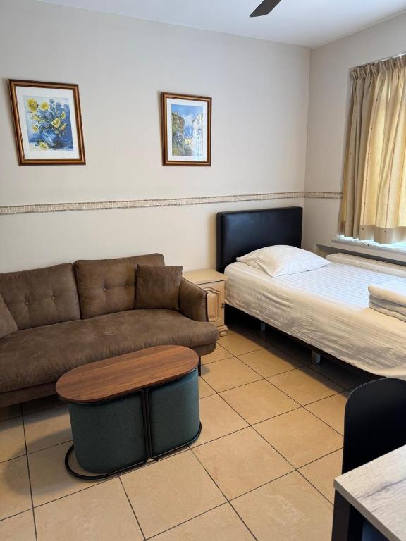 Postel nebo postele na pokoji v ubytování Aparthotel Résidence Bara Midi