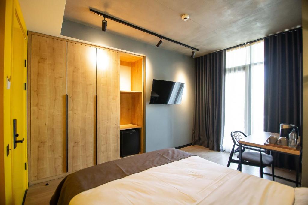 Postel nebo postele na pokoji v ubytování Hotel CH51