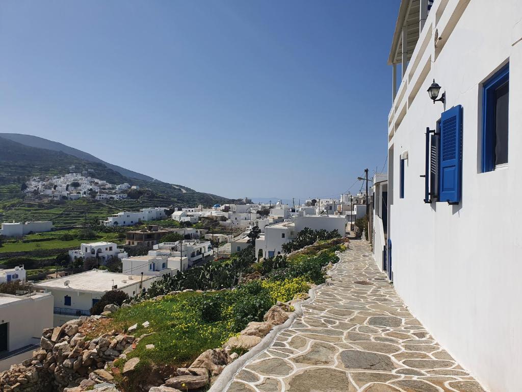 a view of a town from the side of a building at Aeon Blue in Sikinos