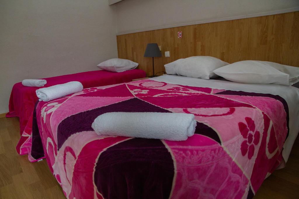 Postel nebo postele na pokoji v ubytování Hotel Durand Le Patio
