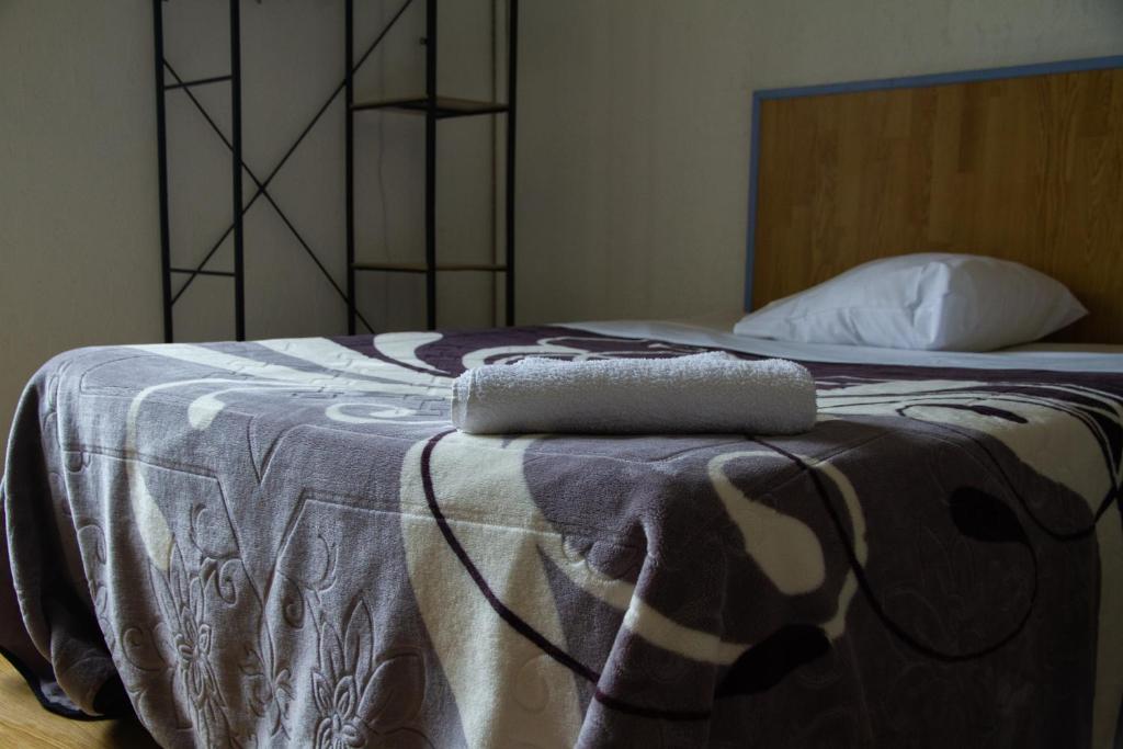 Postel nebo postele na pokoji v ubytování Hotel Durand Le Patio